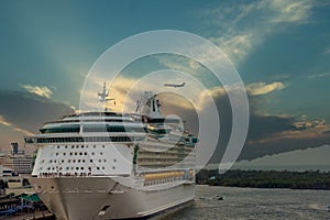 Cruise Ship and Plane at Dusk