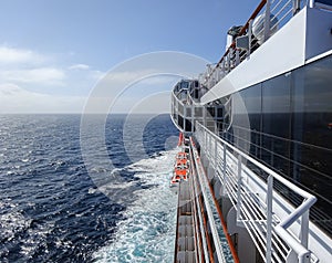 Cruise ship with port side on the ocean.