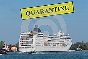 Cruise ship in the port under quarantine because of pandemic of coronavirus Covid-19, conceptual photo