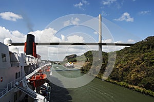 Cruise ship Queen Elizabeth 2 passing Panama Canal near the bridge