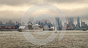 Cruise ship Regent Navigator sailing next Manhattan in New York. Skyline of New York Manhattan cruising on the Hudson