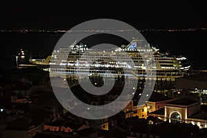 Cruise ship in the port of Lisbon at night