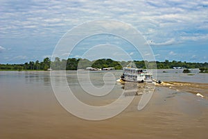 A cruise ship sailing on the Amazon River