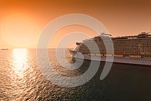 Cruise Ship Sailing into Sunset