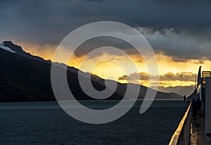 Cruise ship sailing to dawn in Beagle channel in Chile