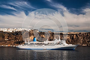 Cruise ship in Santorini Aegean Sea, Greece photo