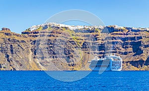 Cruise ship in Santorini Caldera Fira village above Cyclades Greece