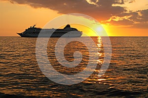 Cruise Ship At Sunset