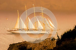 Cruise ship at sunset in Santorini