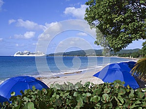 Cruise ship and tropical beach