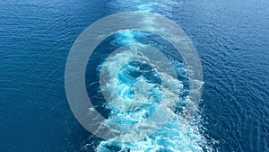 A cruise ship wake in the Atlantic Ocean on a sunny day