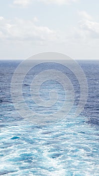 Cruise ship wake or trail on ocean surface