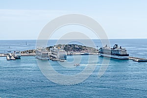 Cruise ships docked at a port in Ibiza, Spain