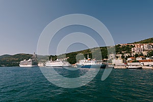 Cruise ships moored in the port of Gruz in Dubrovnik, near the bridge.