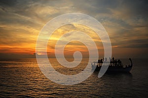 Cruise at sunset time in Indian Ocean, Maldives