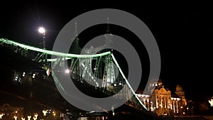 cruise under Liberty Bridge of Budapest Hungary beautiful historical landmark river night attraction view