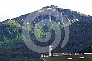 Cruiseship bow with mountain