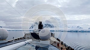 Cruiseships and snow covered mountain and glacier a frozen and clam atmosphere
