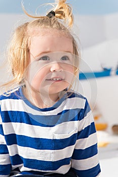 Cruising with kids. Child smiling face striped shirt looks like sailor. Kid boy toddler travelling sea cruise. Child