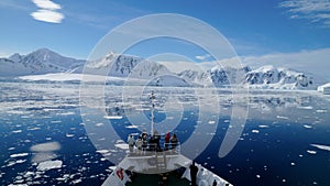 Cruising through the Neumayer channel full of Icebergs in Antarctica.