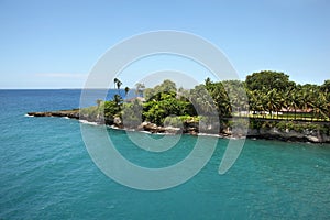 Cruising past beautiful landscape into the port of La Romana, Dominican Republic, Caribbean