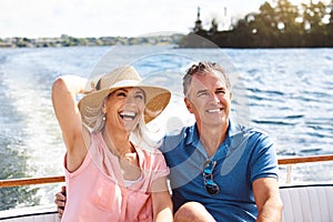 Cruising through retirement. a mature couple enjoying a relaxing boat ride.