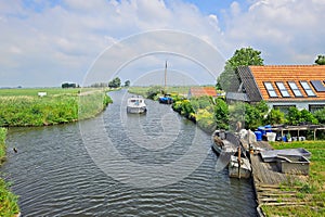 Cruising on vacation through the countryside from Friesland in the Netherlands