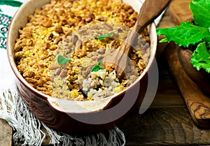 Crumble with forcemeat and sunflower seeds