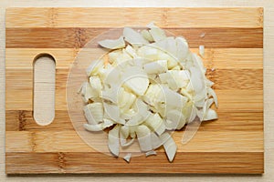 crumbled heap of white onions