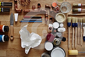 Crumbled piece of paper surrounded by ideas photo