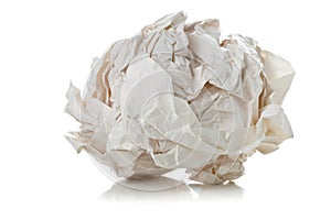 Crumbled white paper ball on white background