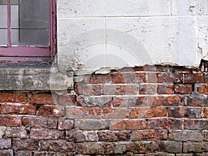 Crumbling brickwork of house