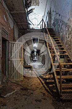 Crumbling Corridor in an Old Prison