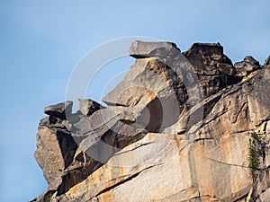 Crumbling rock. Abstract crumbling cliff rock formation. Eroding rock cliffs