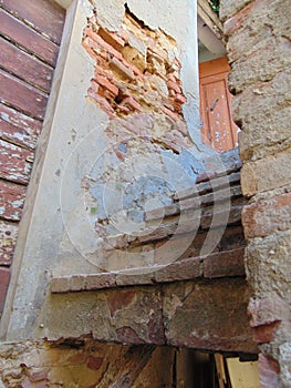 Crumbling staircase, abandoned medieval house, Toiano, Pisa, Italy.