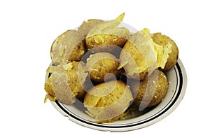 Crumbly jacket potatoes in a plate on a white