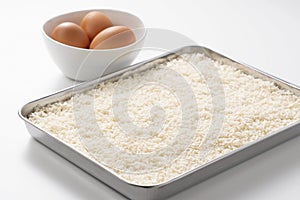 Crumbs and eggs on a white background