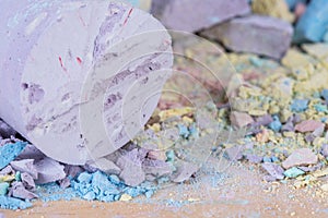 Crumbs and pieces of pastel chalk