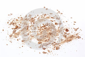 Crumbs scattered on white background photo