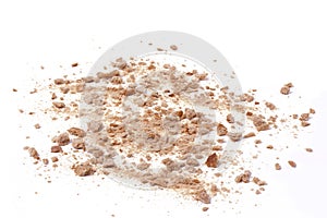 Crumbs scattered on white background photo