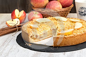 Crummble apple cake, homemade apple pie on rustic table