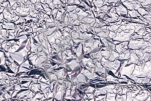 Crumpled aluminum tin foil texture as background