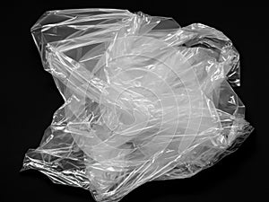 crumpled black plastic bag