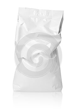 Crumpled blank paper bag package with creases on white photo