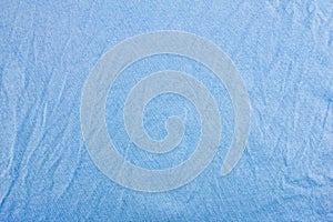 Crumpled blue fabric background texture