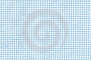 Crumpled blue lined graph or grid paper