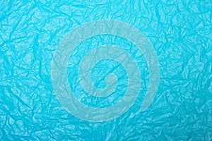 Crumpled blue plastic texture
