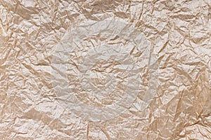 Crumpled brown kraft paper texture background