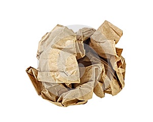 Crumpled brown paper isolated over white background. Crumpled paper ball