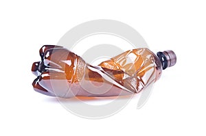 Crumpled Brown Plastic Bottle Isolated